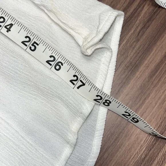 White dress with blue floral design. - Picture 8 of 10